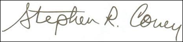 A readable signature inside a box.